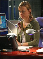 Chloe O'Brian at her desk