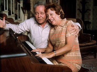 Archie and Edith Bunker singing All in the Family theme song