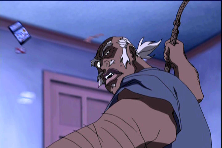 Uncle Ruckus wielding a whip