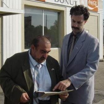 Larry Davitian as Azamat Bagatov and Sacha Baron Cohen as Borat Sagdiyev