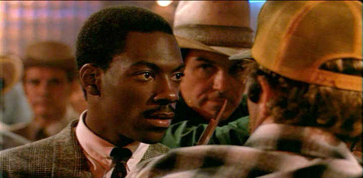 Eddie Murphy as Reggie Hammond in 48 Hrs redneck bar scene