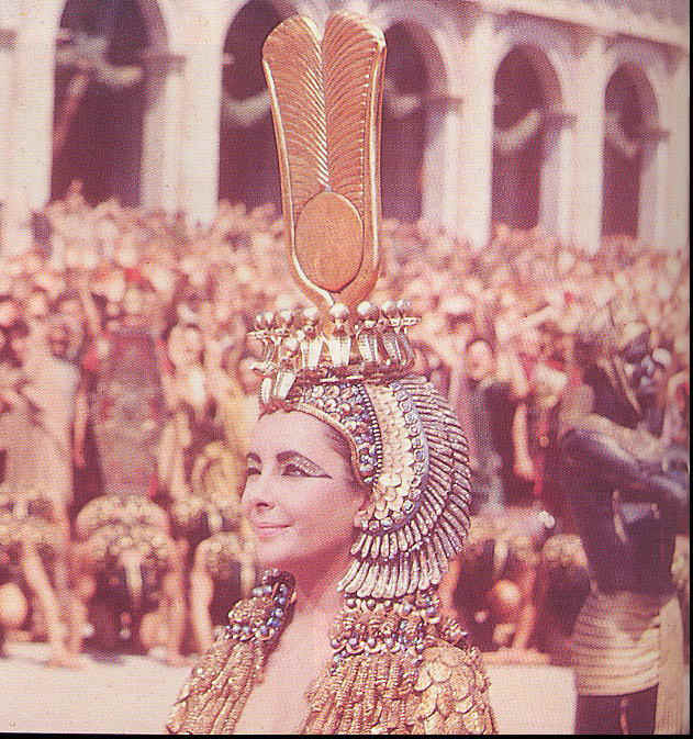 Elizabeth Taylor winks her eye as Cleopatra