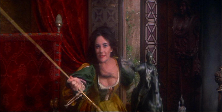 Elizabeth Taylor wielding the rod