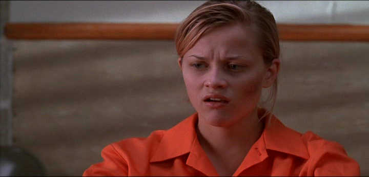 Reese Witherspoon in an orange prison jumpsuit