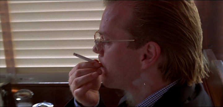 evil Kiefer Sutherland smoking a cigarette