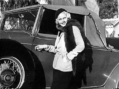 Jean Harlow in car and furs