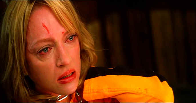 Beatrix Kiddo with a chain wrapped around her neck