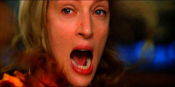 closeup of Uma Thurman in battle from Kill Bill