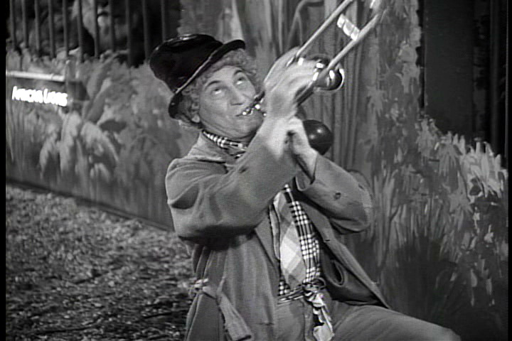 Harpo Marx playing trombone