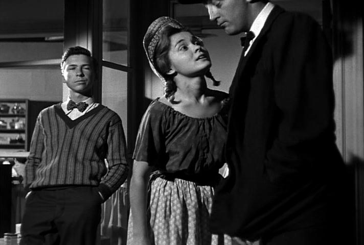Michael Chapin, Gloria Castilo, and Robert Mitchum in Night of the Hunter, 1955 image