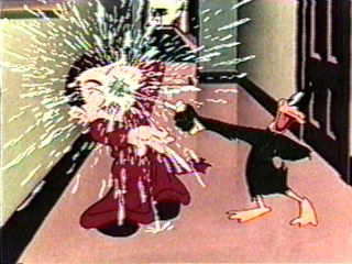 Daffy Duck squirts water on Peter Lorre