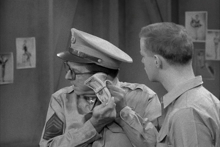 Sgt. Bilko counting the money
