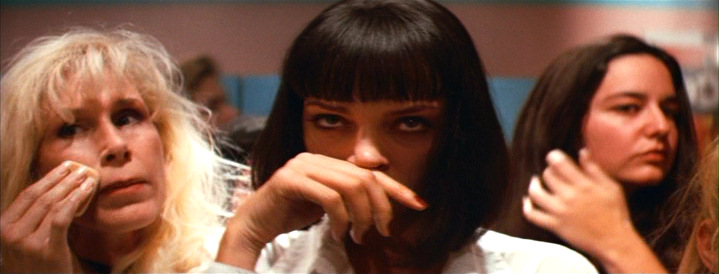 Mia Wallace powders her nose