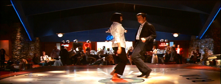 John Travolta and Uma Thurman dancing the night away