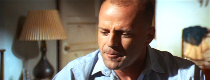 contemplative Bruce Willis as Butch Coolidge in Pulp Fiction