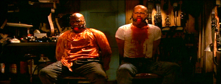 Bruce Willis and Ving Rhames bound and gagged in Pulp Fiction