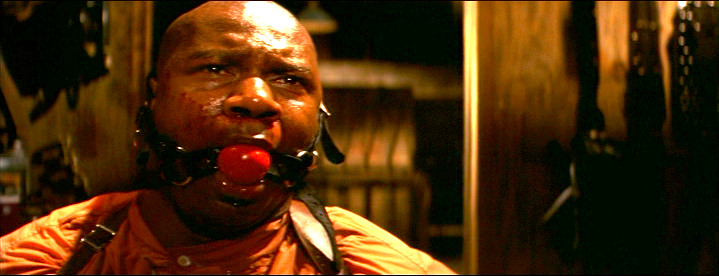 Ving Rhames as Marsellus Wallace gagged and bound