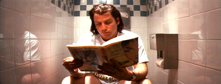 Vincent Vega reading "MODESTY BLAISE" by Peter O'Donnell
