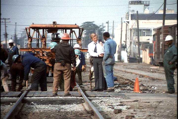 politician campaigning amongst construction workers