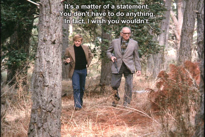 father and son in the woods