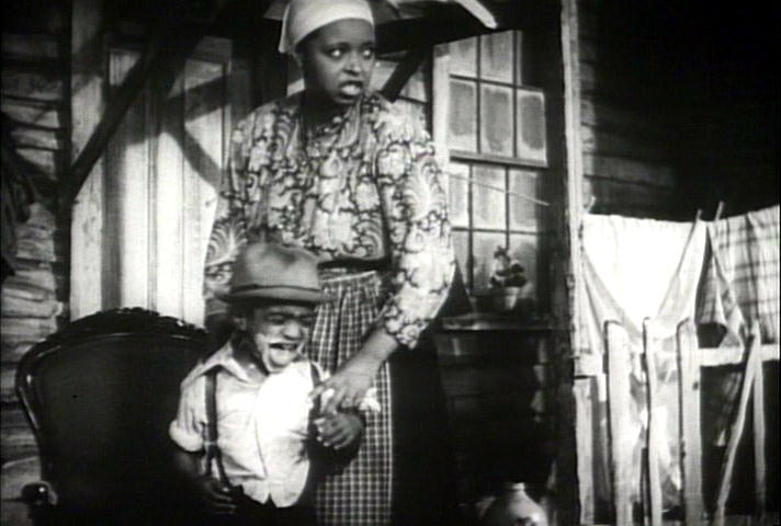 crying young Sammy Davis Jr with cake on his face  - Was he the cutest child actor ever?