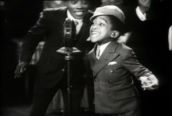 smiling young Sammy Davis Jr