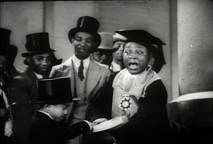 swearing in Sammy Davis, the first African-American president