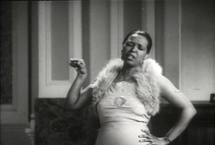Ethel Waters with her hand on her hip