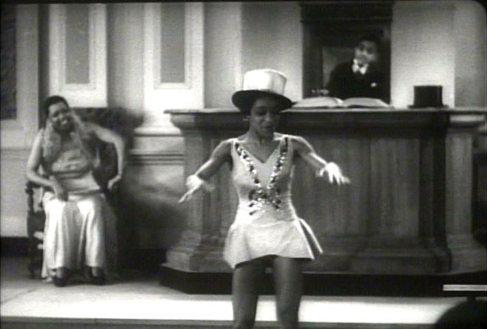 Ethel Waters and Sammy Davis watch the dancing girl