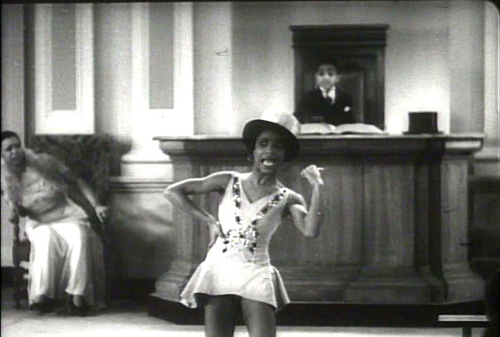 Ethel Waters and Sammy Davis watch the dancing girl