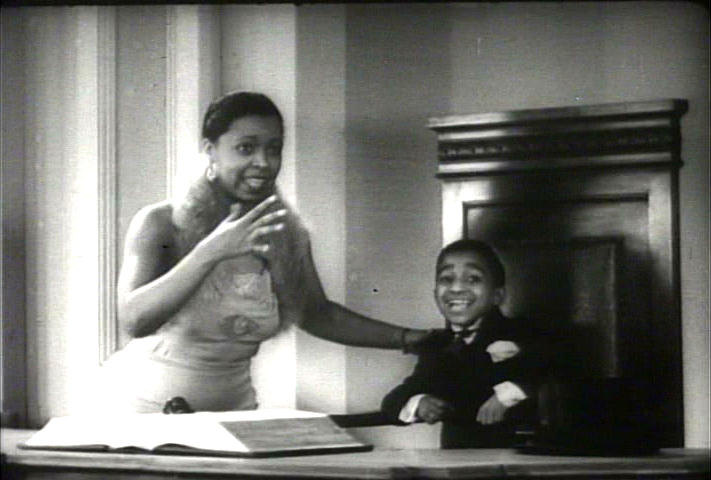 Sammy Davis and Ethel Waters getting their picture took