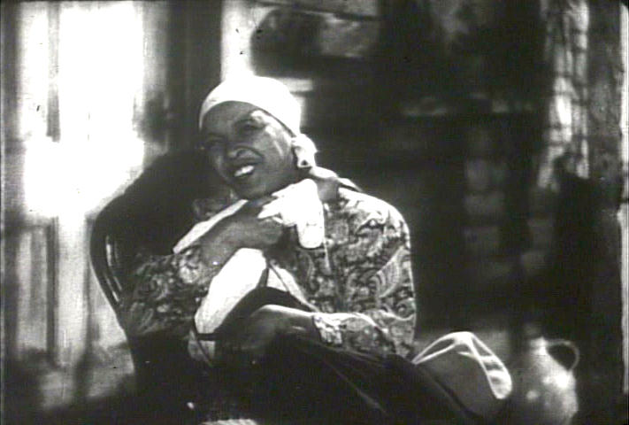 Ethel Waters hugs Sammy Davis Jr, 1933 movie image