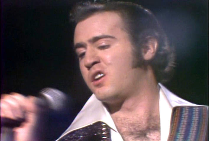 Andy Kaufman impersonates Elvis Presley