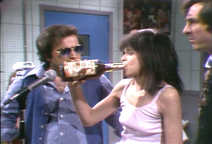 Gilda Radner drinking Wild Turkey