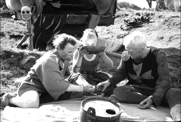 sharing a humble meal of wild strawberries and fresh milk