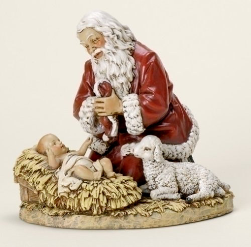 Santa Claus admires baby Jesus in the manger