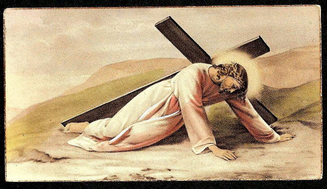 Jesus breaking under the weight of the cross he's carrying