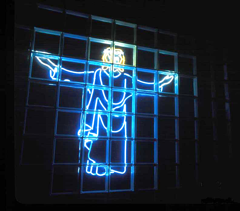 Neon emblem of Jesus on the cross