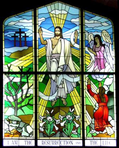 stained glass image of the resurrected Christ