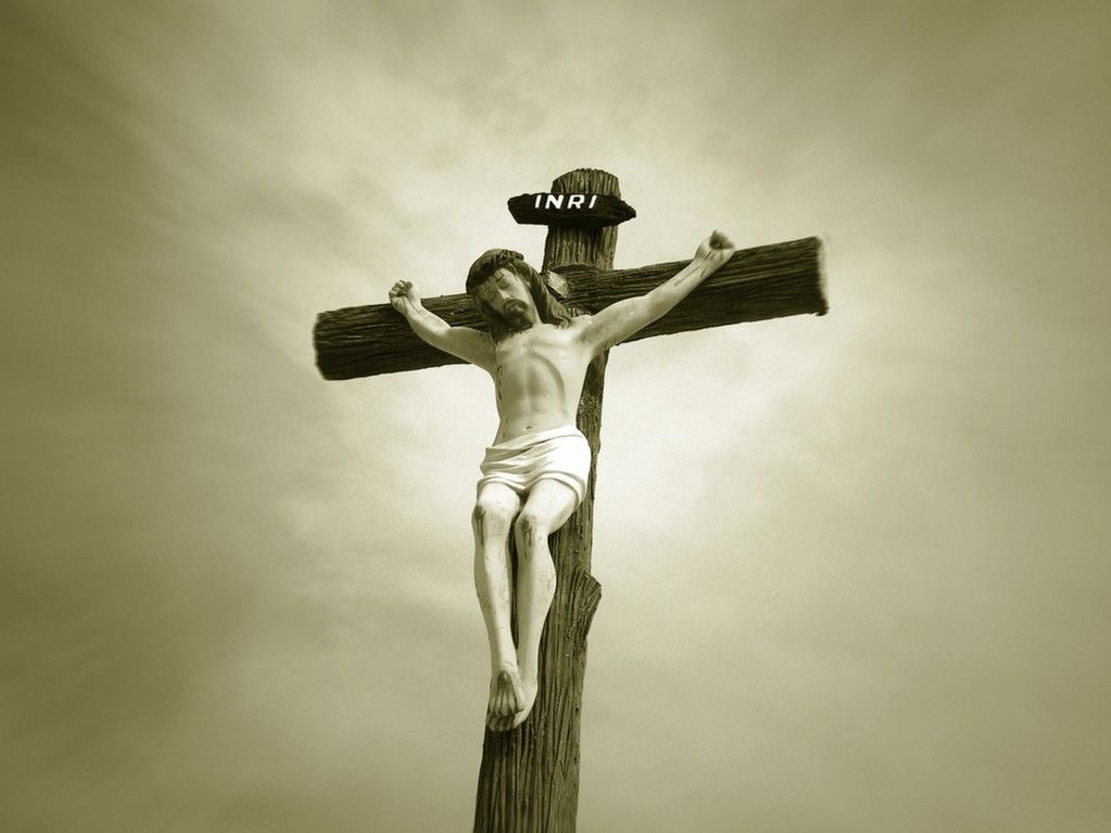 wallpaper image of a sculpture of Jesus on the cross