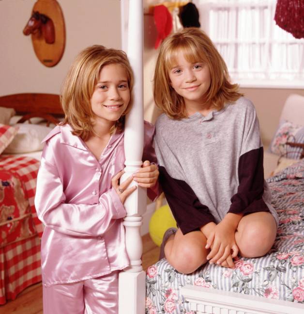 childhood photo of Mary-Kate and Ashley Olsen