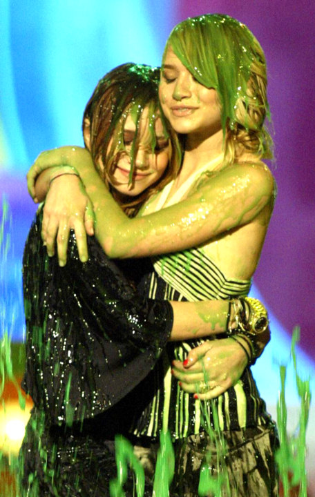 the Olsen twins are covered in slime on Nickelodeon