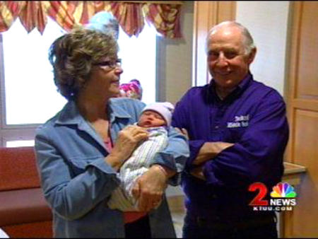 proud grandparents Sally and Chuck Heath with baby Trig Palin