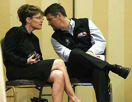 Sarah Palin consults her husband Todd