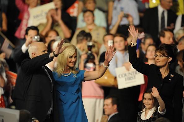 McCains and Palins waving to the crowd