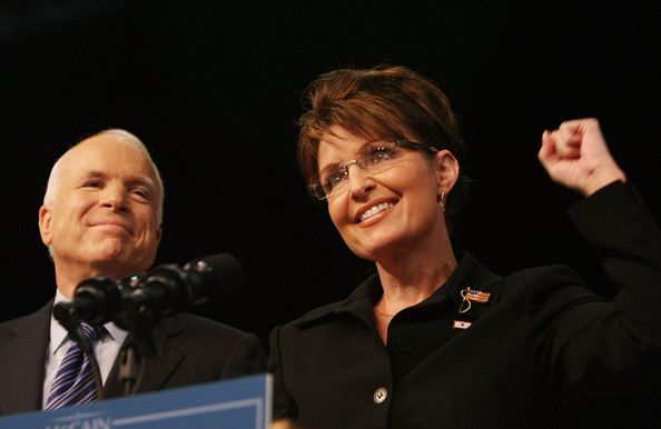 John McCain smiling down on Sarah Palin
