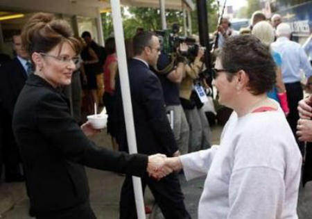 Governor Palin shakes hands with a voter