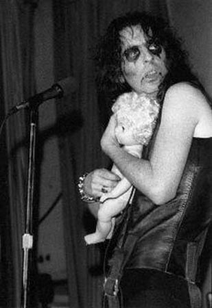 Alice Cooper protects his baby doll