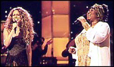 Mariah Carey and Aretha Franklin singing