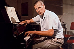 George Martin at the piano